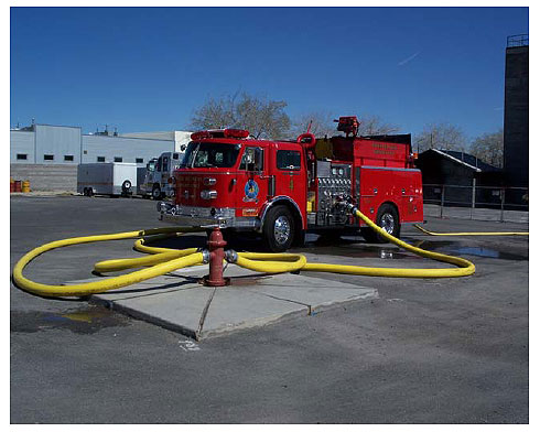 Anchor and Hold Water Delivery Evolutions for Wildland-Urban Interface Firefighting Operations