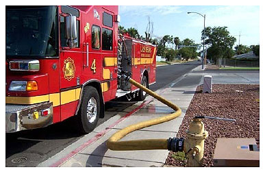 Anchor and Hold Water Delivery Evolutions for Wildland-Urban Interface Firefighting Operations