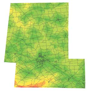 One-mile road distance increments from developed water sources are depicted in color