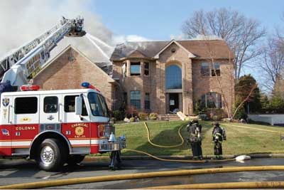 (8) This attic space fire shows smoke from the B/C side of the residence; what is missing here is topside ventilation.