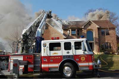 (9) Significant changes in attic fire conditions are evident around the roof line.