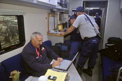 (3) Suffolk County TF1 and NY-TF1 jointly planning the Hurricane Sandy mission.