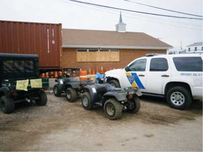 (5) All-terrain vehicles in the OEM's parking lot.