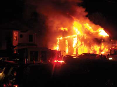 (2) The fully involved, two-story modular home fire in West Haverstraw, New York.