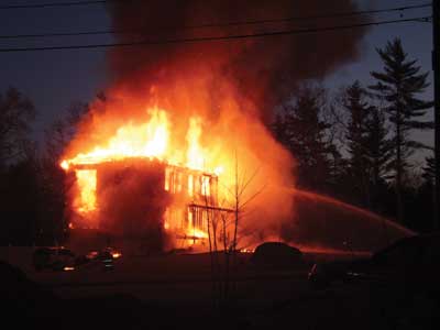 (1) The fully involved, two-story modular home fire in Acushnet, Massachusetts. [Photos courtesy of Acushnet (MA) Fire & EMS unless otherwise noted.]