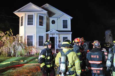 (6) This house is the Bravo exposure and is a mirror image of the fire building. Note the large soffits on the attic over the windows. (Photo by Tom Bierds.)