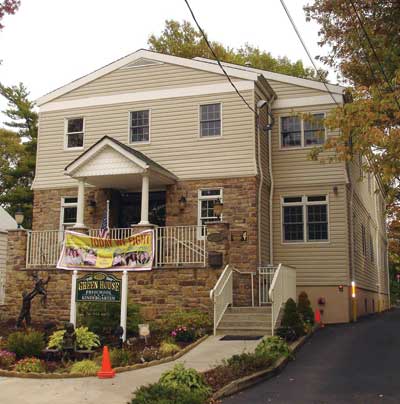 This 2½-story building appears from the exterior to be a Type V wood frame/platform structure. 