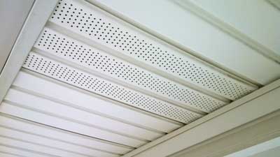 third-floor balcony with vinyl siding, vinyl ceiling, and a perforated vinyl soffit