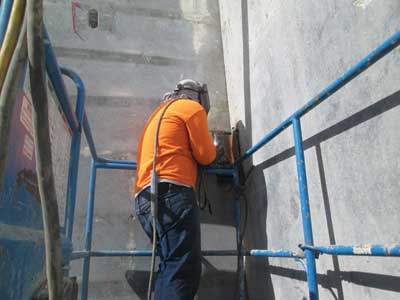 (2) A steel angle is welded to the steel in the wall sections to fasten them in the corners)