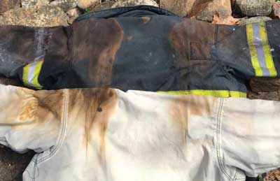 (3) The discoloration of the turnout coat shell and liner