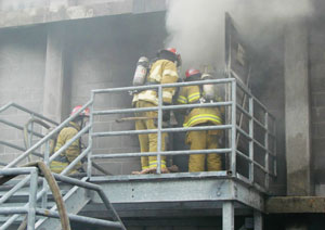 (1) Live fire training at the Class A burn building. (<i>Photo courtesy of VBFA.</i>)