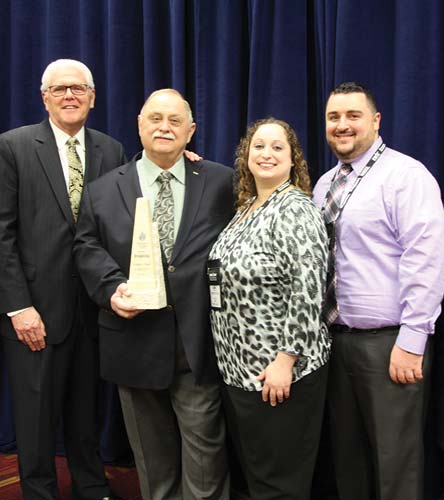 (2) (l-r) National Fire Academy Superintendent Denis Onieal, Bill Peters, Meri Peters, and Mike Tuohey.