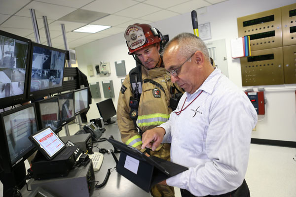 Firefighters manage intelligence at the scene of an incident.