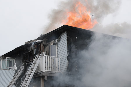 (4) Fire in the attic space intensified rapidly; two additional ladders were placed to windows on the second floor. It is vital to communicate the location of these ladders to members on the interior of the fire building.