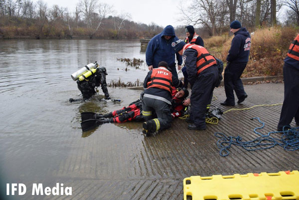 Members of the Indianapolis Fire Department dive rescue team participate in a real-time training evolution.