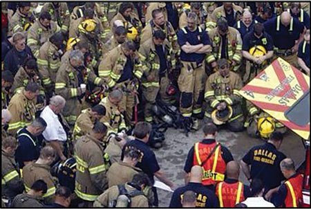 (8) On-scene personnel gather for a moment of silence for Firefighter Stan Wilson. <i>(Photo by Karen Hoskins.)</i>