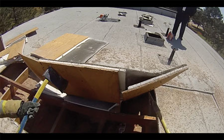 (1) Members drilling on the roof of a commercial structure encounter a gypsum deck over a plywood deck. The supporting members of this roof appear to be 2×4s to allow easier pitching of the roof for drainage. <i>(Photos 1-4 by Dave Topczynski.) </i>