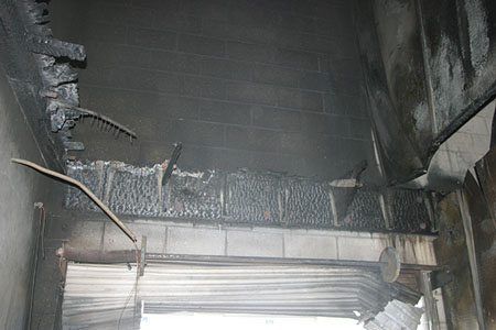 (8) The effect of fire on the second-floor platform. <i>[Photos courtesy of the Orange County (CA) Fire Authority.]</i>