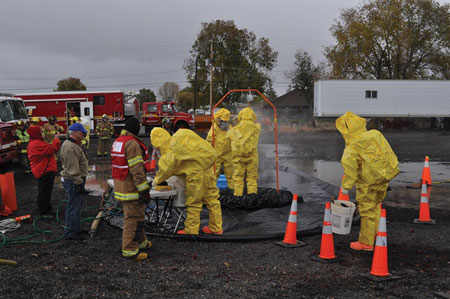 (6) An Oregon National Guard Weapons of Mass Destruction Civil Support Team participated in the decontamination setup and conduct during the multiagency exercise simulating a terrorist explosion and chemical leak. You must monitor safety issues, particularly regarding the use of props.