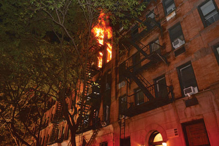 (7) The front fire escape and the lack of a rear fire escape necessitated a rescue from the fifth floor using a lifesaving rope.