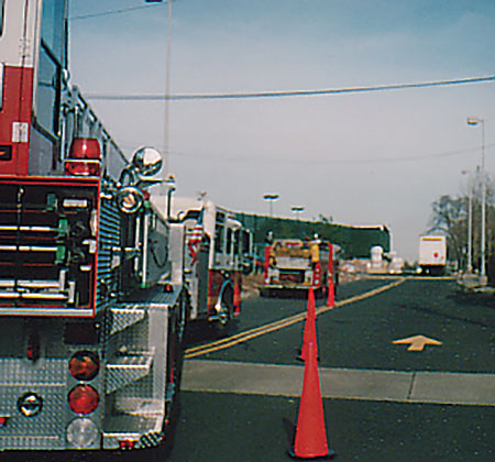 (3) On scene, designating a staging area expedites the movement of personnel, equipment, and traffic. Proper apparatus placement is critical for a smooth transition from a single alarm to a multicompany response. 