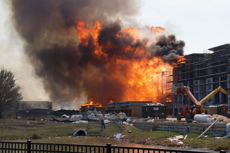 (1) Within minutes, a spark from a welder ravaged the apartment building under construction.<i> [Photos 1-2 by Jason Rhodes, Overland Park (KS) Fire Department.]</i>