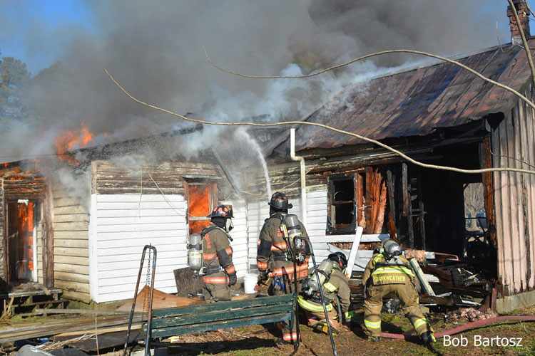 Firefighters operate at a house fire in North Carolina