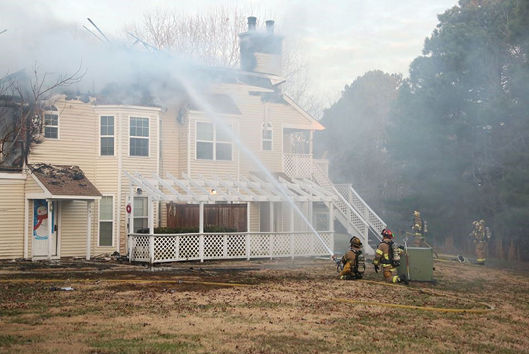 (5) During the defensive operation, handlines were used to limit the spread of fire to the unburned portion of the apartment building. 