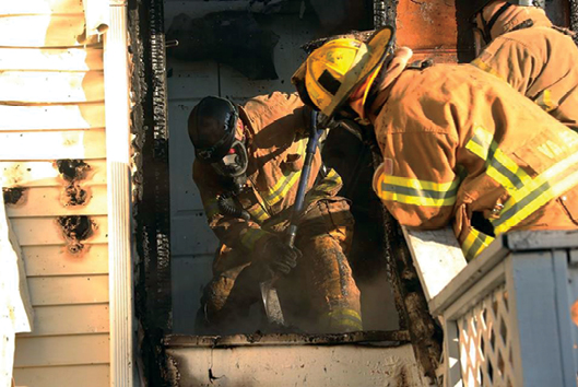 (6) The fire investigator digs out the area of origin to determine the cause of the fire. 