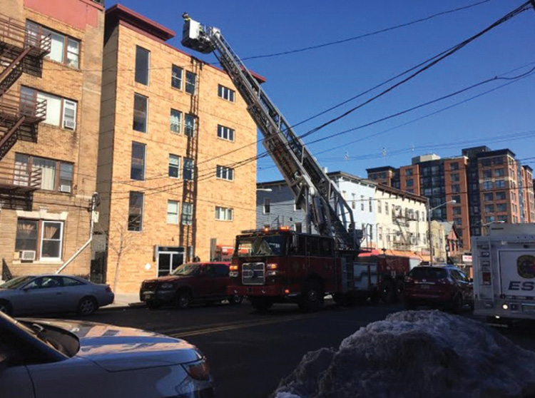 The busy streets of Hudson County, New Jersey. Fortunately, the police department responds and closes off one lane for fire department investigations, allowing the aerial to be placed in operation. (Photos by author unless otherwise noted.)