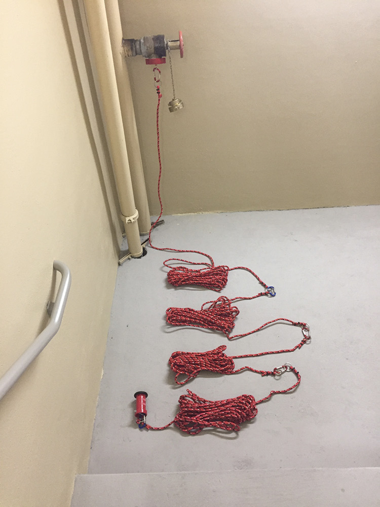 The 200 feet of “hose” are coupled and connected to the standpipe.