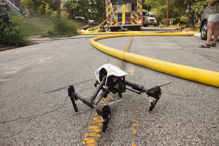 Drone and fire hose