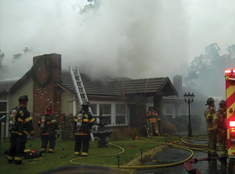 A sudden and dramatic change in smoke conditions occurred. Division A was able to identify the issue and work with task-level crews to fix the problem. If the incident commander does not have a view like this, outside changes can be overlooked, or the radio traffic can explode. In this case, the radio remained relatively quiet as Division A worked directly with crews to remedy the issue of flow path control.