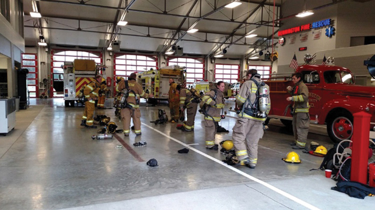 Recruits drill on donning personal protective equipment, first for accuracy, then for time.