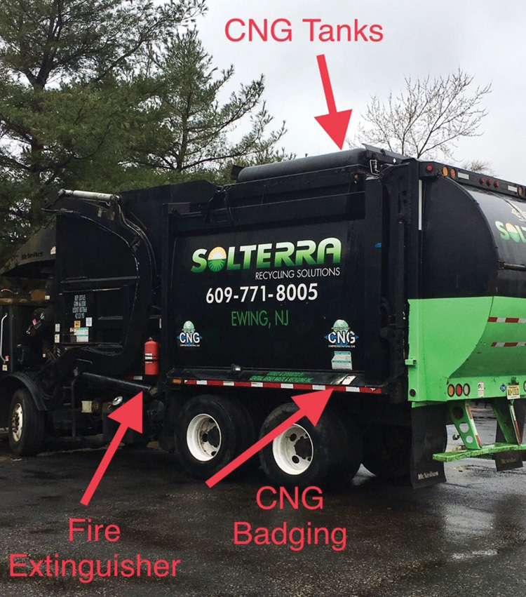 This sanitation truck runs on compressed natural gas (CNG). Other CNG clues include the cylinder housing and CNG badge. Consider CNG and hydraulics when these trucks are burning or involved in accidents. If the sanitation truck is burning, determine if the fire is confined to the hopper or to the cab or if fire is underneath the truck.