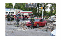 Indy firefighters at the scene of the collapse and collision.