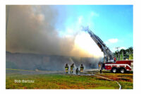 Firefighters hit the fire from the ground and the air.