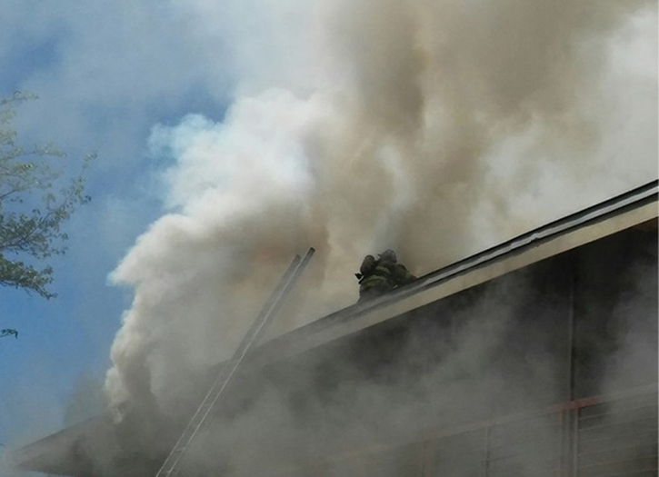 Minutes later, firefighters were injured after falling through the peaked roof