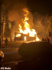 Indianapolis firefighter on scene of a raging fire