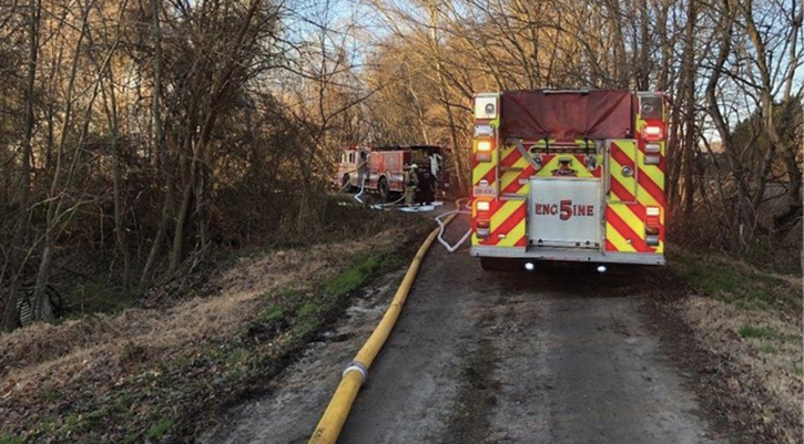 Engine 5 and Engine 10 positioned on the narrow dirt roadway.