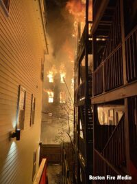 A view of the flames between buildings