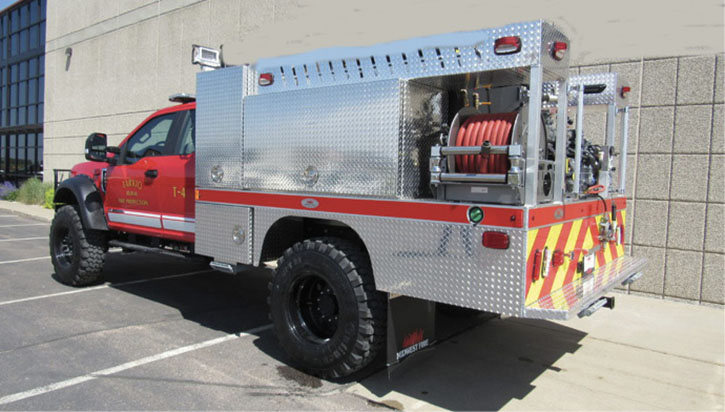 The Tarkio (MO) Rural Fire Department operates this brush truck built by MIDWEST FIRE TANKER. 