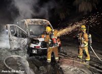 Firefighters cut into the vehicle to extinguish the fire