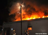 Fire through the roof of the building