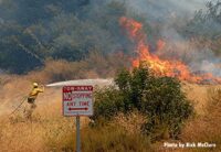 Flames tear through the brush