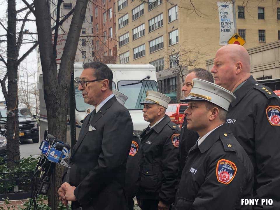 Fire Department of New York officials communicate with the media