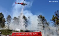 Helicopter at scene of smoky California brush fire