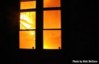 Flames seen through a window