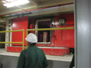 Man with construction helmet in building