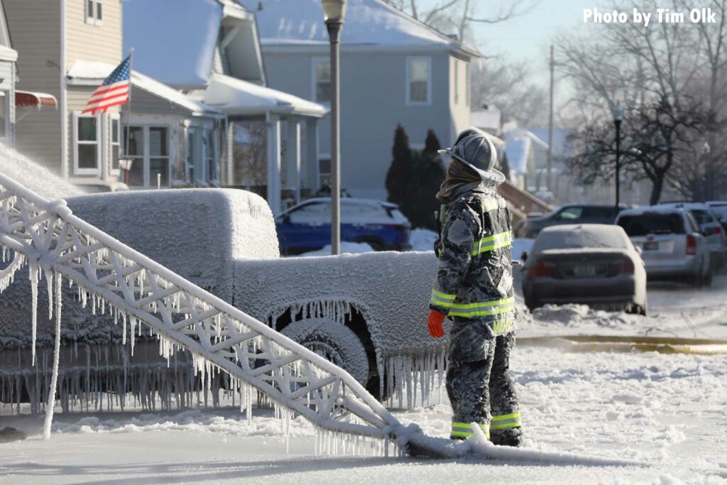 Icicles and a firefighter at the scene of the fire